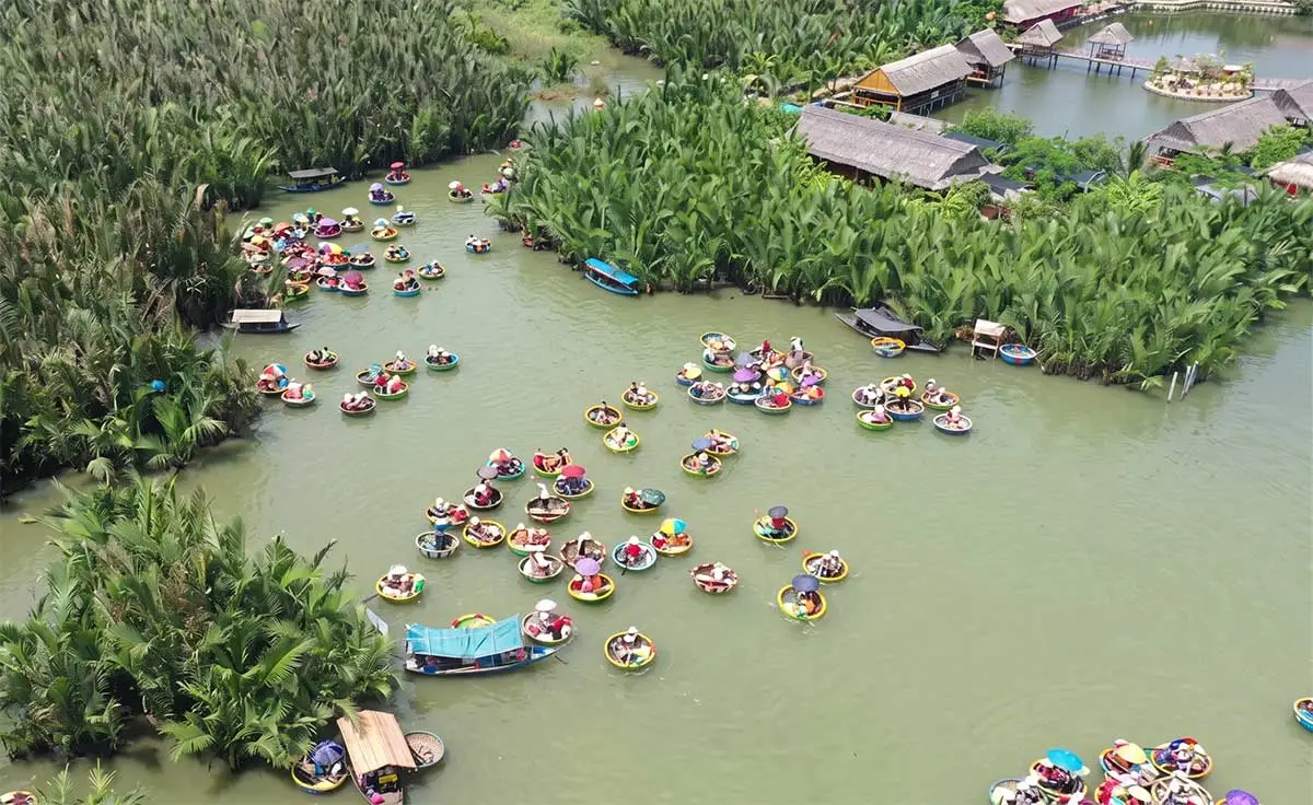 Tourists enjoying a basket boat experience in Hoi An.